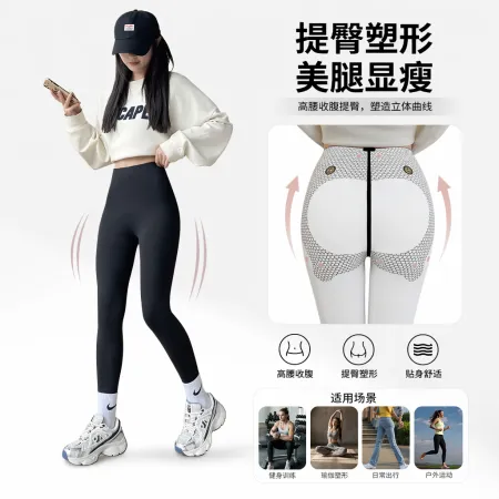 Reference pictures of a female model's outfit with black skinny pants and a white top Reference pictures of a female model's outfit with black skinny pants and a white top